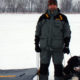 Lawrence and Moby on the ice with a sled