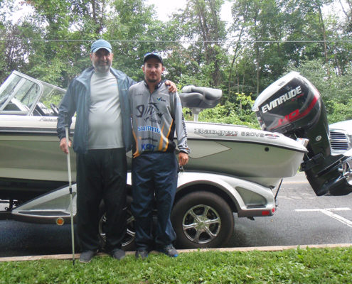 Lawrence and Cory Gaffney in front of the Ranger 620