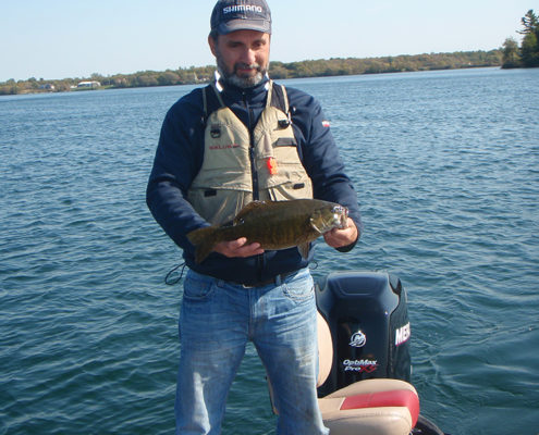 Lawrence holding smallie 