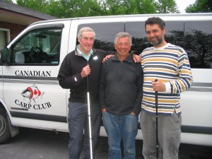 Photo of Miles, Jeff and Lawrence in the parking lot at the Long Sault Motel